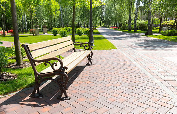 Bench and brick path to the park