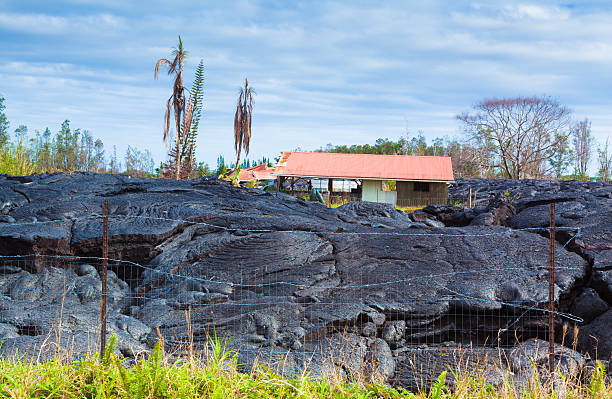 destroyed home in lava - pelé stok fotoğraflar ve resimler