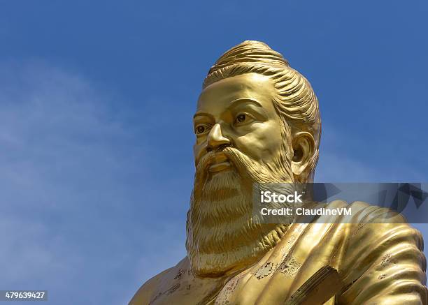 Statue Of Tiruvalluvar In Vellore India Stock Photo - Download Image Now - Author, Gold - Metal, Gold Colored