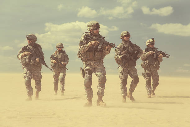 infantrymen in action United States paratroopers airborne infantrymen in action in the desert marines stock pictures, royalty-free photos & images
