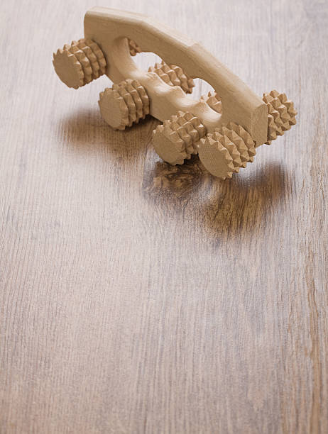 istock one massager on wooden background 479641236