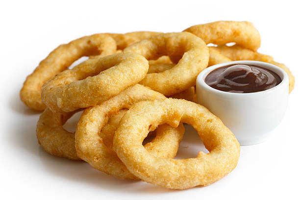 istock Pile of deep fried onion or calamari rings. 479647042