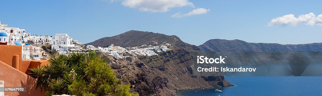 City on the rocks panorama of the city on the rocks . white houses with blue roofs. island in the sea 2015 Stock Photo