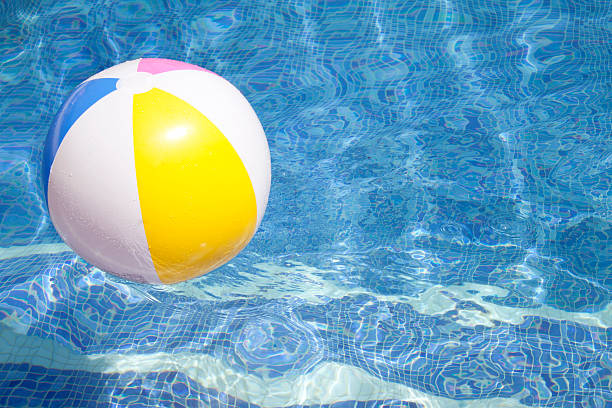 istock Ball floating in a blue swimming poo 479651852