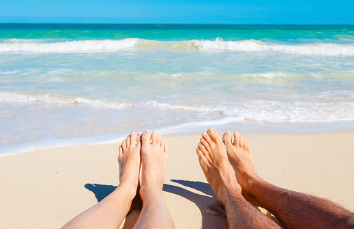 Couple enjoying the beach. (location Hawaii)