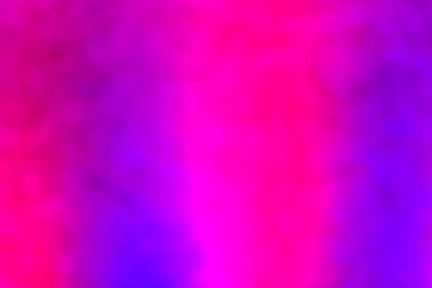 istock High key blurred image of pressboard with pink purple light 479653990
