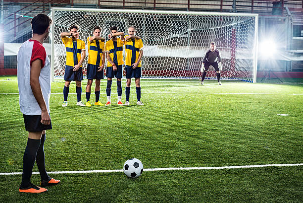 istock Football match in stadium: Free kick 479654384