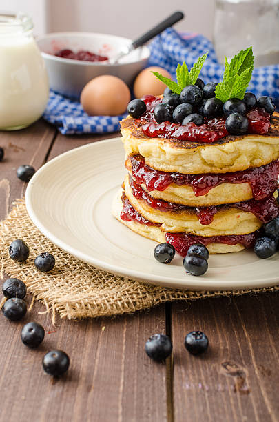 istock Glutten-free pancakes with jam and blueberries 479654410