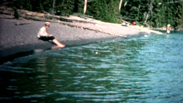 (8mm Vintage) 1968 Women Catching Fish Long Pole Shore