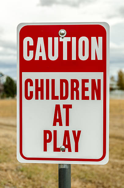 Children at Play Sign stock photo