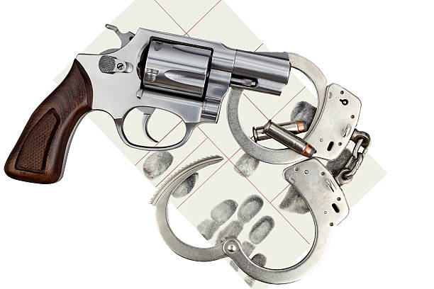 istock Gun with handcuffs and fingerprint ID for criminal arrest 479659108