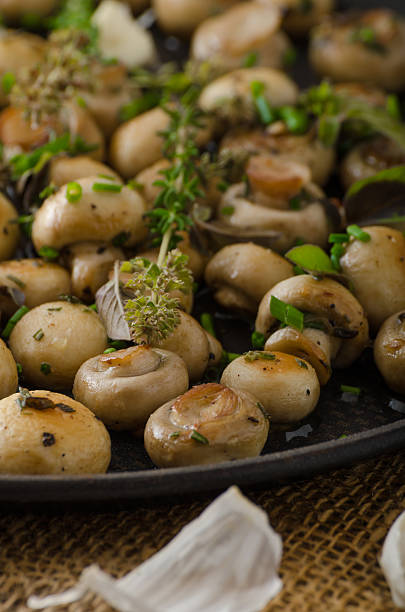 istock Salad of small mushrooms and herbs 479664144