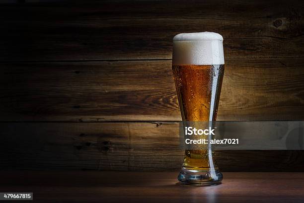 Beer Glass On A Wooden Background Stock Photo - Download Image Now - Backgrounds, Beer - Alcohol, Alcohol - Drink