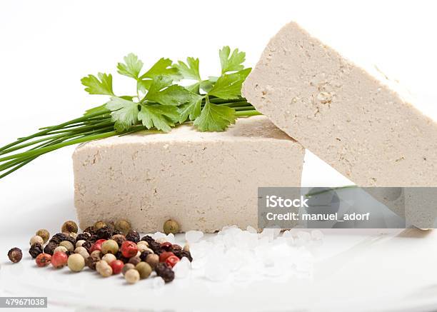 Raw Tofu With Salt Pepper And Fresh Spices Stock Photo - Download Image Now - 2015, Asia, Chive