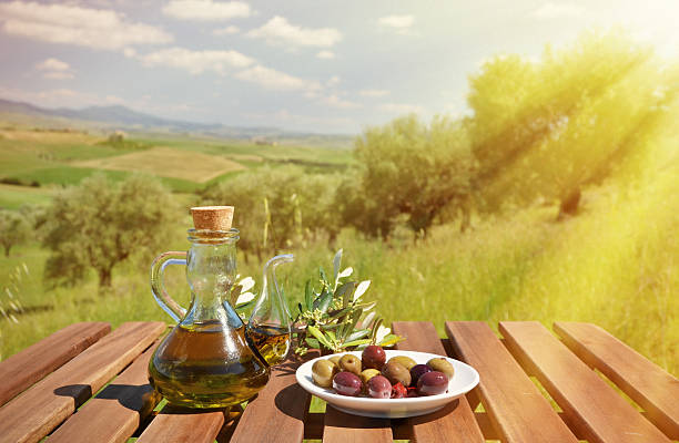 istock Olive oil, olives and bread on the table 479672450