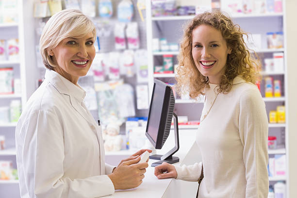 istock Pharmacist and costumer smiling at camera 479678058