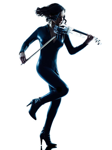 istock Violinist woman slihouette isolated 479688008