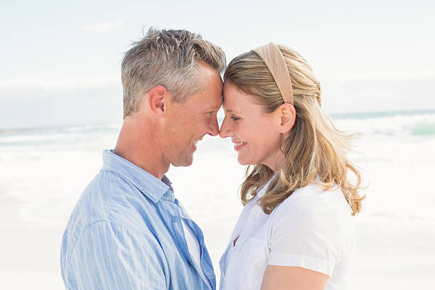istock Happy couple smiling at each other 479689272