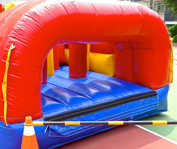 istock Inflatable bouncy castle in school 479689308