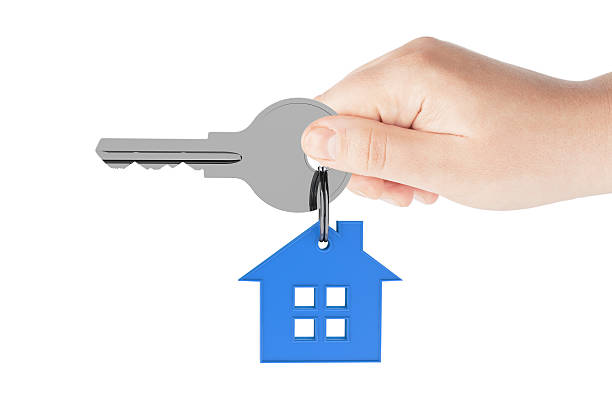 istock Human hand holding house key 479689738
