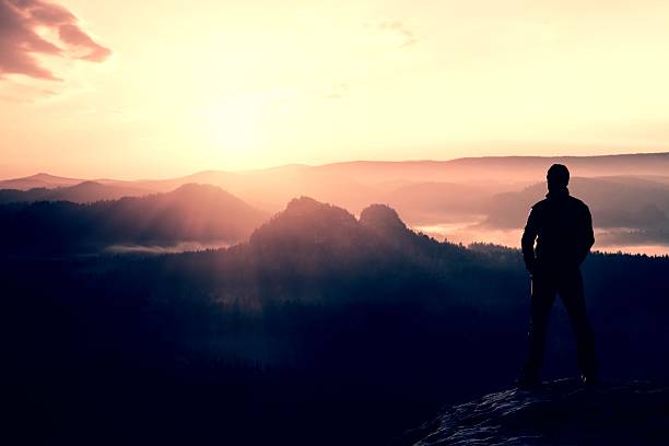 istock Hiker on sharp rock in empires park, watch to Sun 479690052