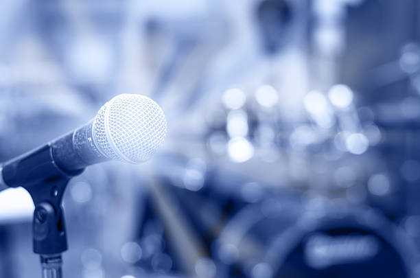istock Close up of microphone on musician blurred background 479692882