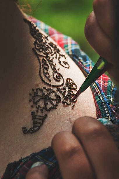 istock The process of drawing mendi focus on the tattoo 479693586