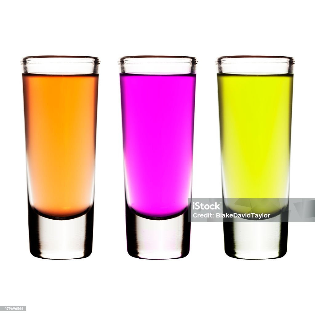 Three Shots 3 colorful alcohol shots in classic shot glasses 2015 Stock Photo