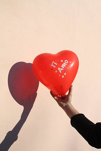 heart balloon with the word love