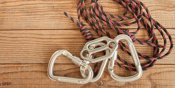 istock Mountain gear for climbing on wooden background 479703832