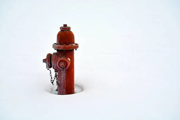 Photo of Frozen Red fire hydrant in the snow