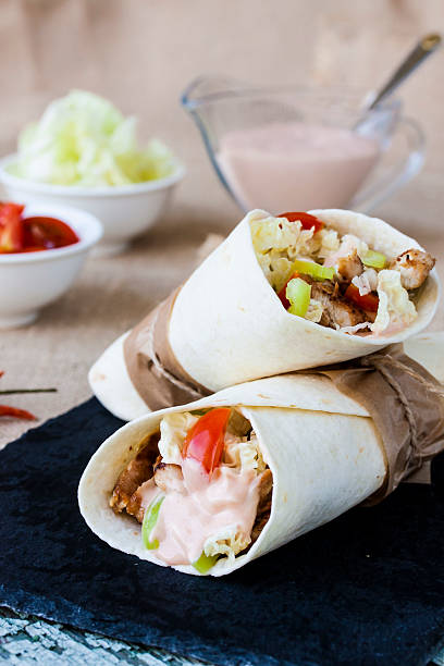 istock tortilla wrap with chicken breast and vegetables 479704628