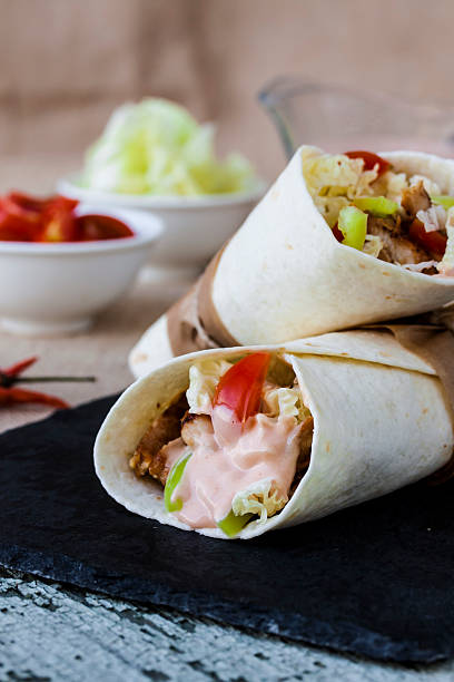 istock tortilla wrap with chicken breast and vegetables 479705332