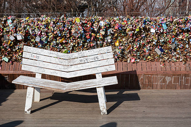 Special bench and Love padlocks or Locks of love at N Seoul Tower, famous attraction in Seoul, South Korea.