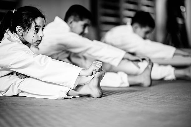 Martial Arts Training Class For Children Martial Arts Training Class For Children taekwondo photos stock pictures, royalty-free photos & images