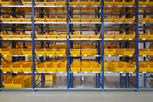 Storage bins Storage bins and trays in distribution warehouse filing tray stock pictures, royalty-free photos & images