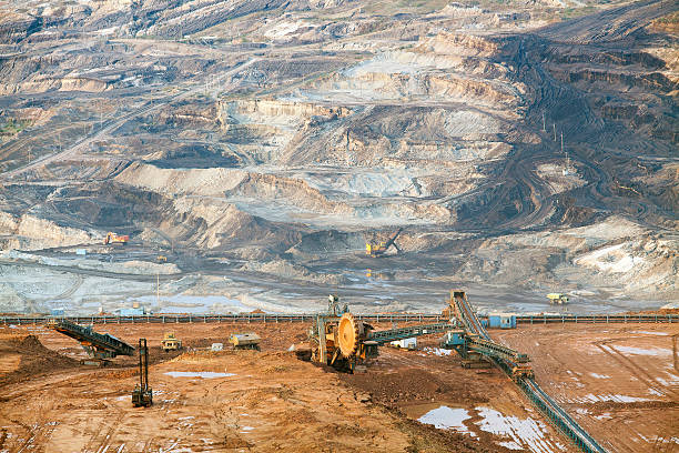 istock Part of a pit with big mining truck working 479718016