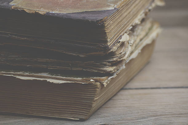istock Old books on wood background 479724900