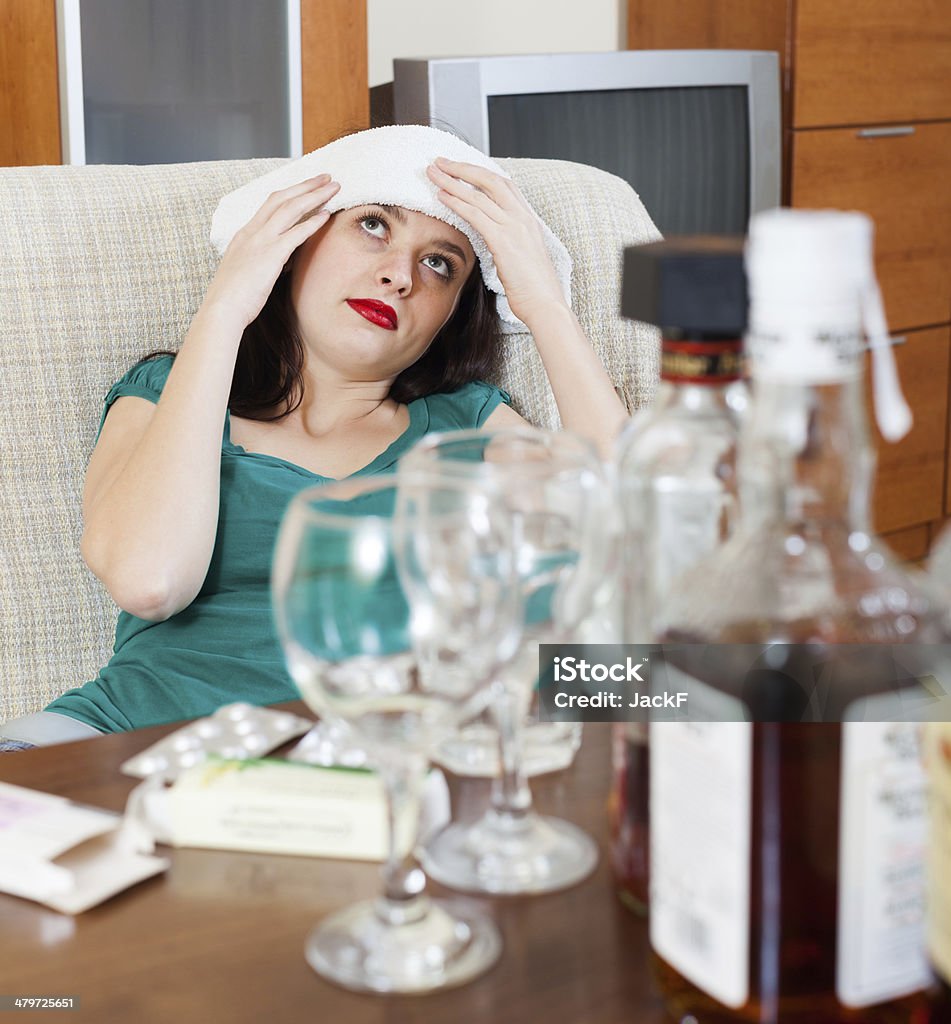 girl having headache girl having headache in morning after party Adult Stock Photo
