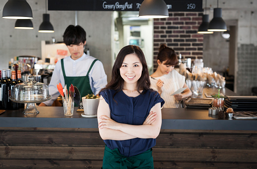 Young asian business woman in a restraurant