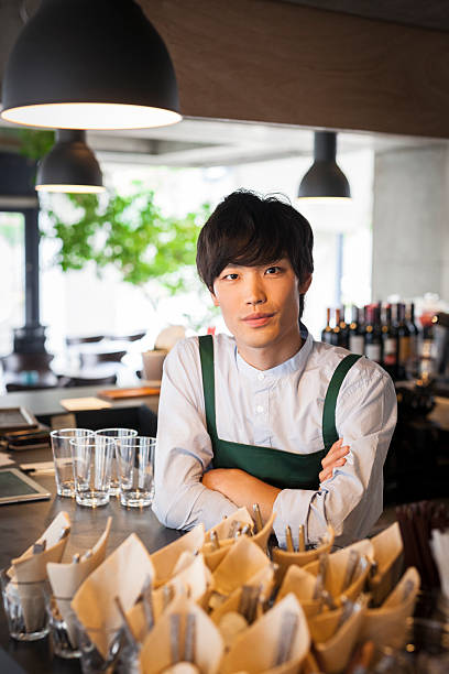 istock Portrait of handsome asian bartender 479726074