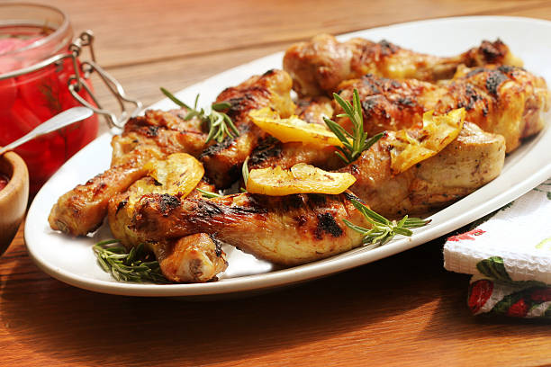 istock Grilled chicken legs with lemon 479726360