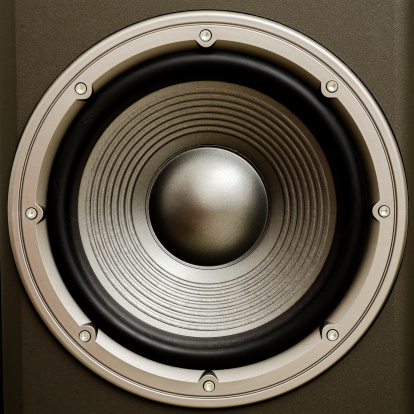 Close up of a stereo audio loudspeaker with a nice finish. This is a woofer or bass cone. Great for all your music projects. There are other shots in this series also...