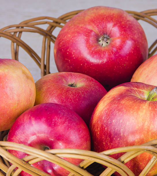 istock fruit large red ripe apples in a ped 479728627