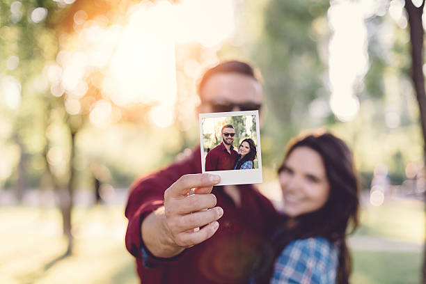 istock Happy couple showing instant selfie 479730142