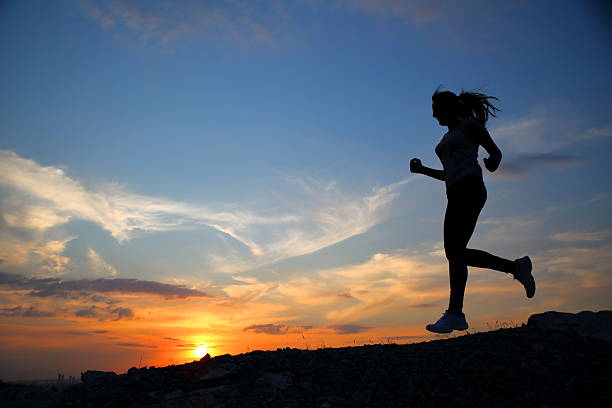 istock Silhouette of running woman 479730720