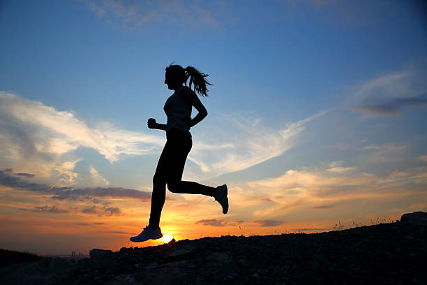 istock Silhouette of running woman 479730722
