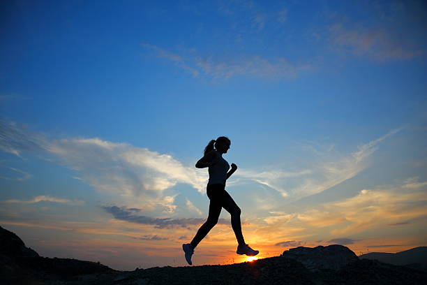 istock Silhouette of running woman 479730724