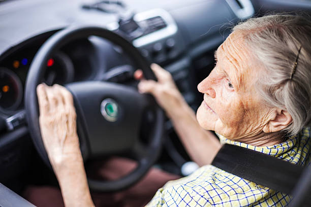 istock Senior woman driving a car 479733010