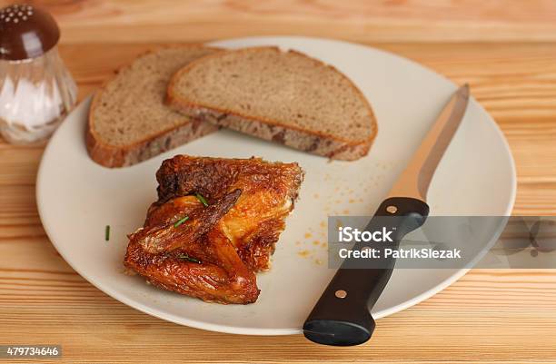 Grilled Chicken Wing With Bread On White Plate Stock Photo - Download Image Now - 2015, Animal Body Part, Animal Wing